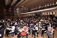 The hall has a full house of more than 1,000 people